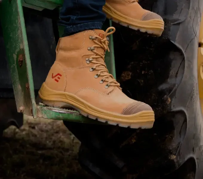 Curve Gear boots on a tractor step